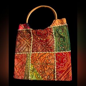 Handcrafted patchwork handbag with sequins. Great condition.